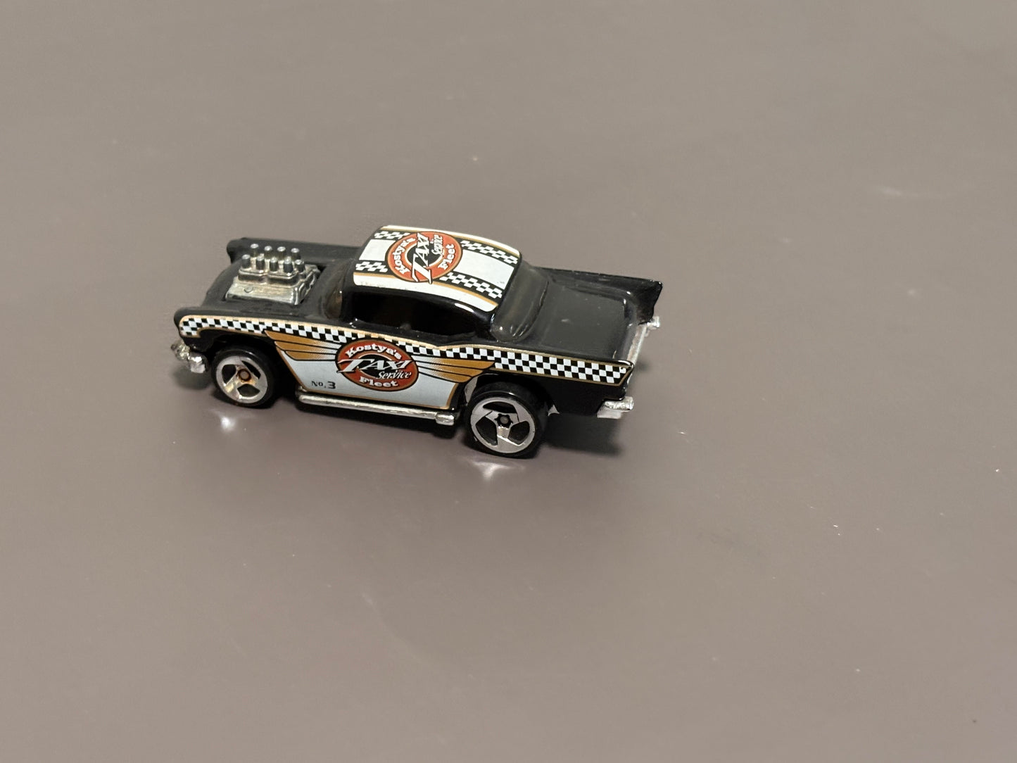 1976 Hot Wheels 1/64 Diecast Black ’57 Chevy Kostya’s Fleet Taxi #3 Malaysia