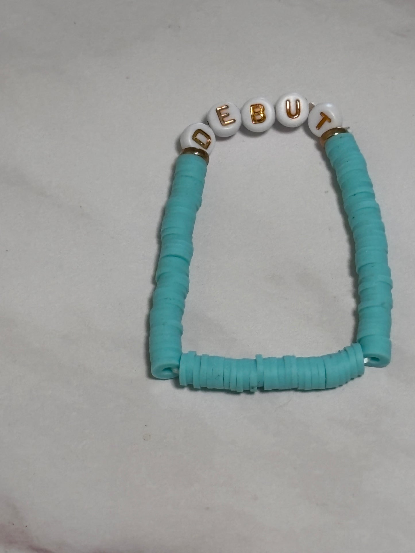 Debut Teal Heishi Word Bracelet 7 Inch Polymer Clay White Gold Letter Beads