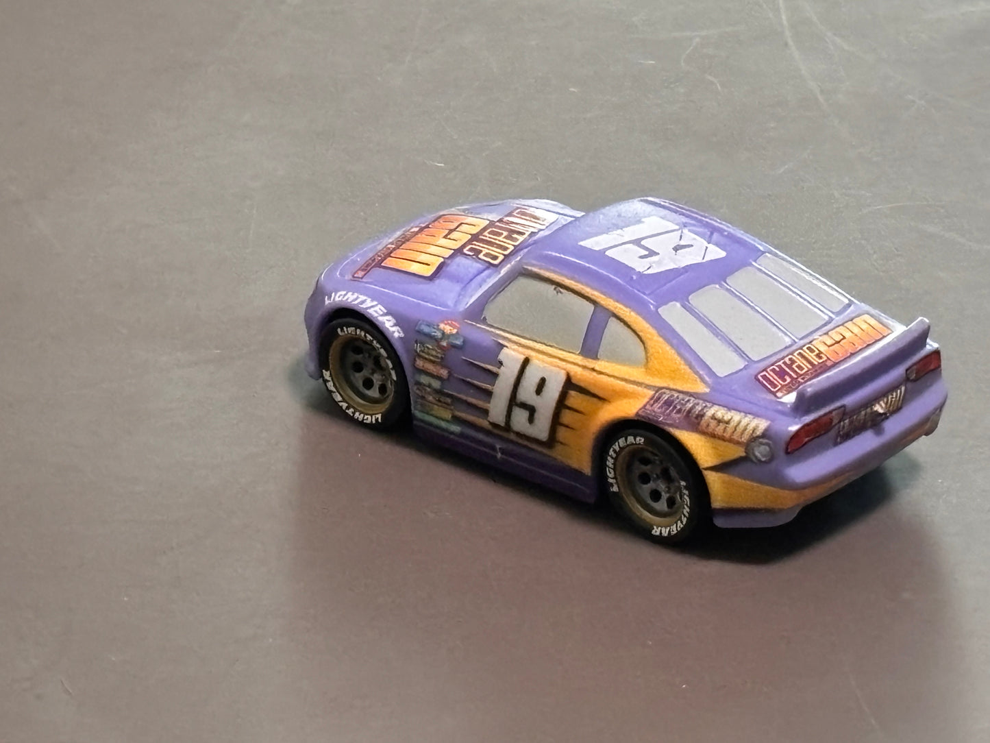 Disney Pixar Bobby Swift World of Cars 3 Octane Gain DieCast Purple 4” 1:55