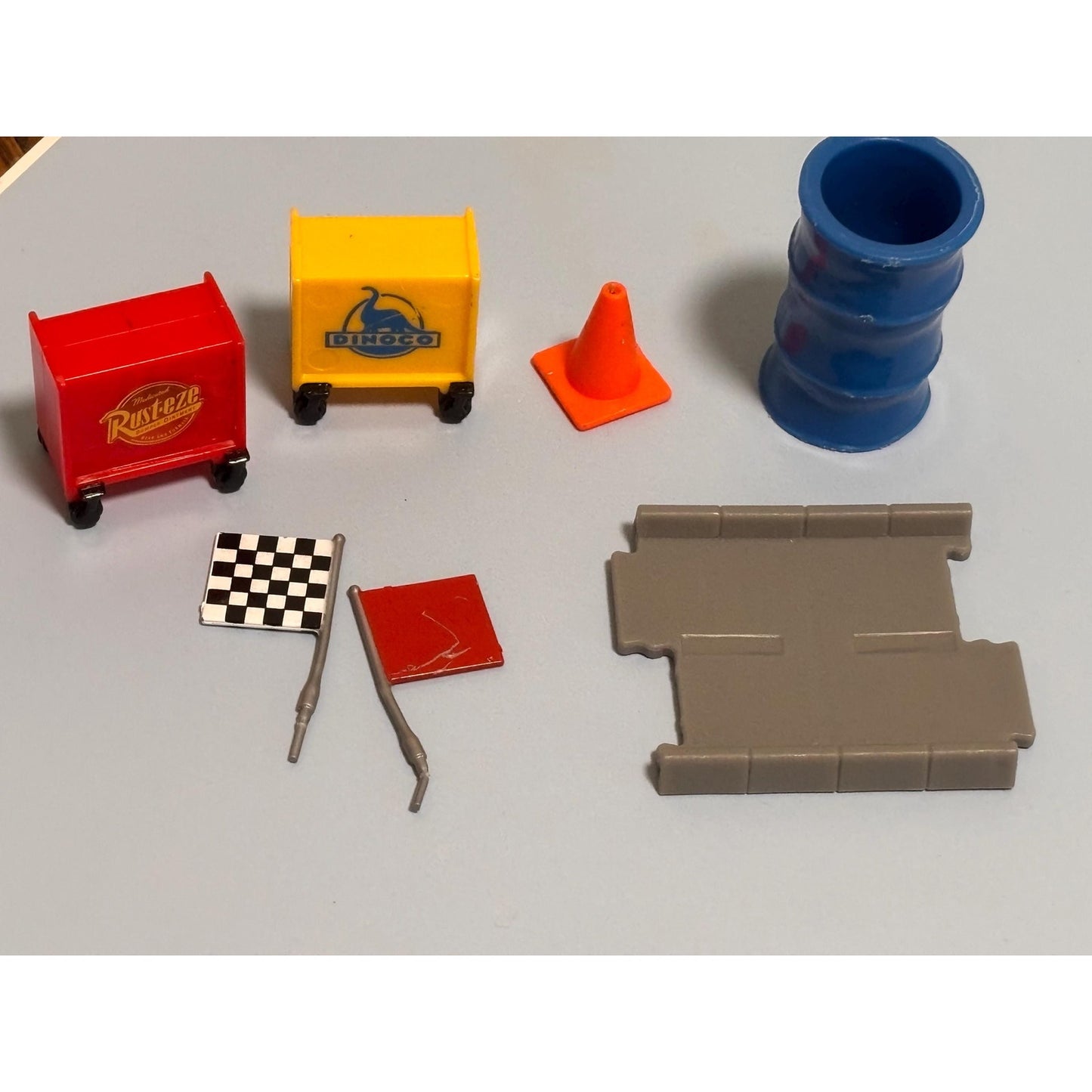 Lot of 7 Disney Pixar Cars Accessories Cones Tool Box Road Tires Dinoco Rust-eze