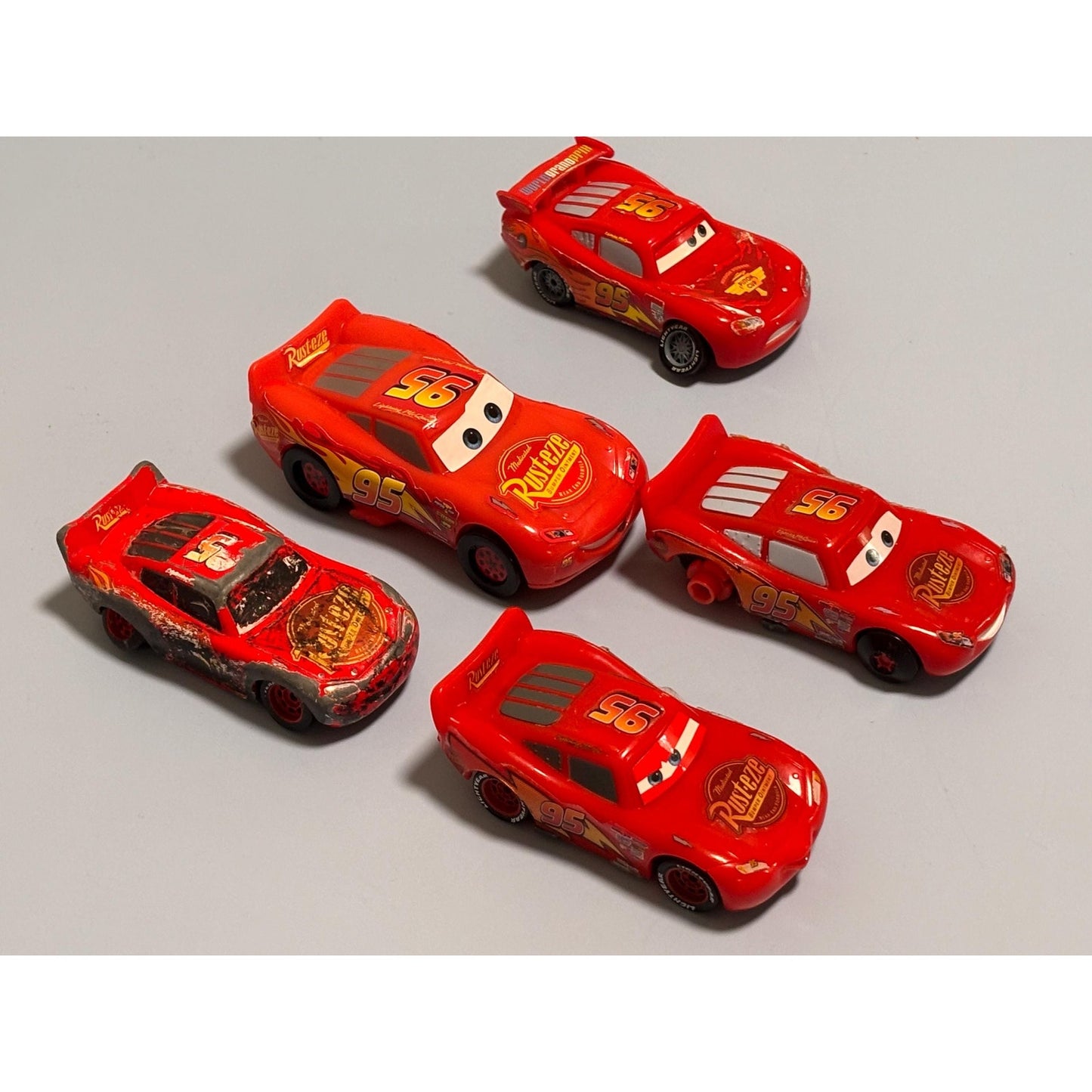 Lot of 5 Disney Pixar Cars 2 Lightning McQueen Diecast and Plastic Rust-eze Red