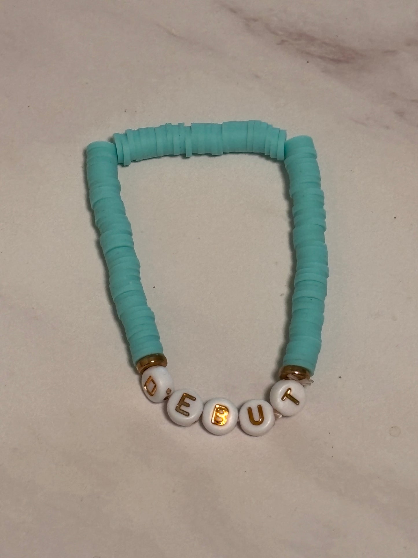 Debut Teal Heishi Word Bracelet 7 Inch Polymer Clay White Gold Letter Beads