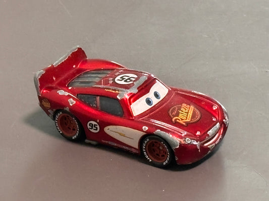 Disney Pixar Cars Radiator Springs Lightning McQueen Dark Red RustEze Metallic 1:55