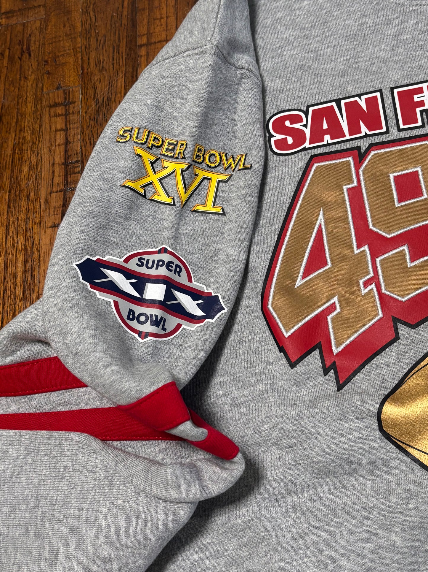 San Francisco 49ers Mitchell & Ness Throwback NFL Super Bowl Champions Big Face Logo All Over Print Long Sleeve Pullover Sweat Shirt Sweater Heather Gray Red Men’s Large L New NWOT