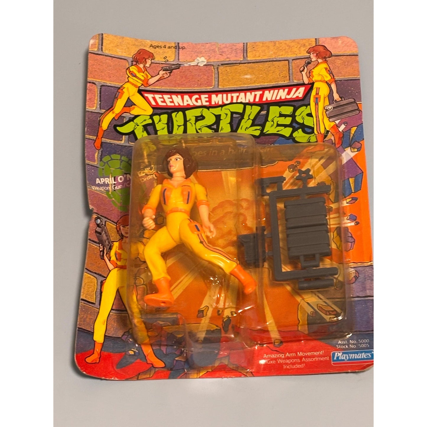 TMNT Teenage Mutant Ninja Turtles April O’Neil Orange Stripes Unpunched New 1990