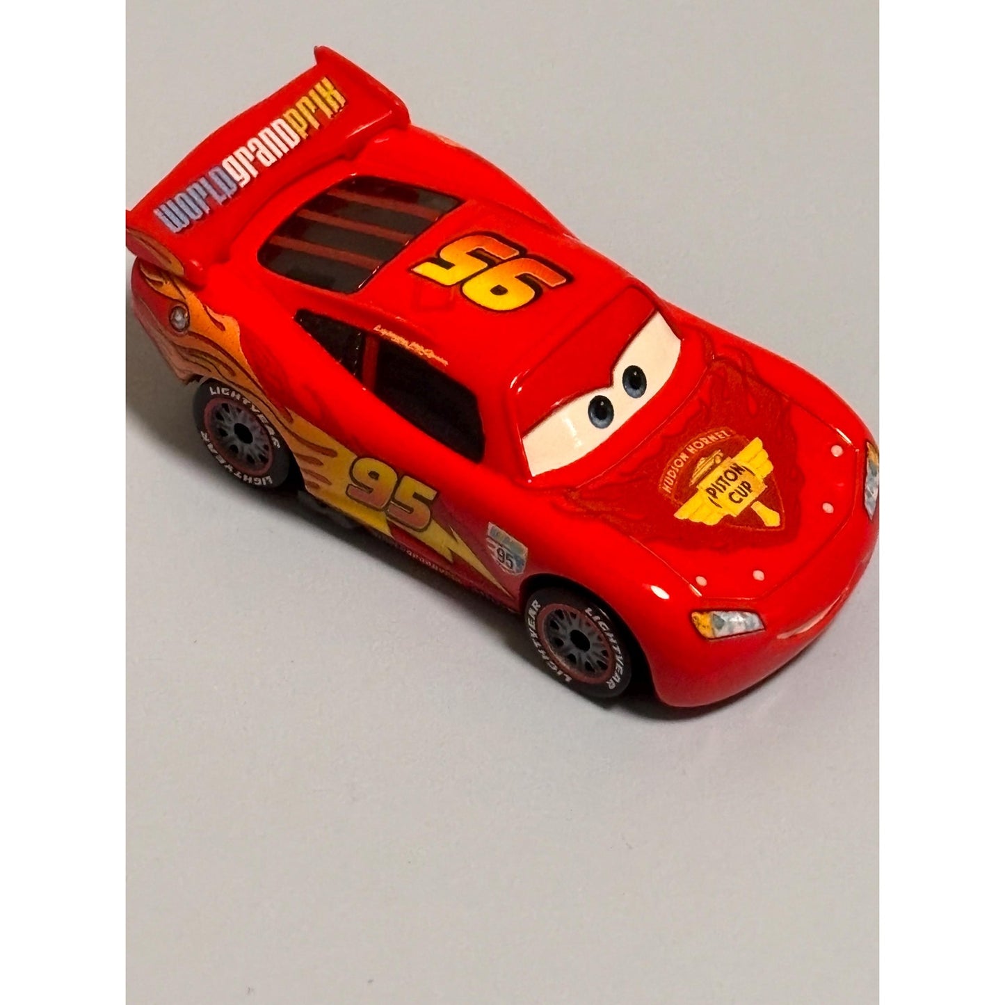 Disney Pixar Cars 2 Lightning McQueen Diecast Piston Cup World Grand Prix