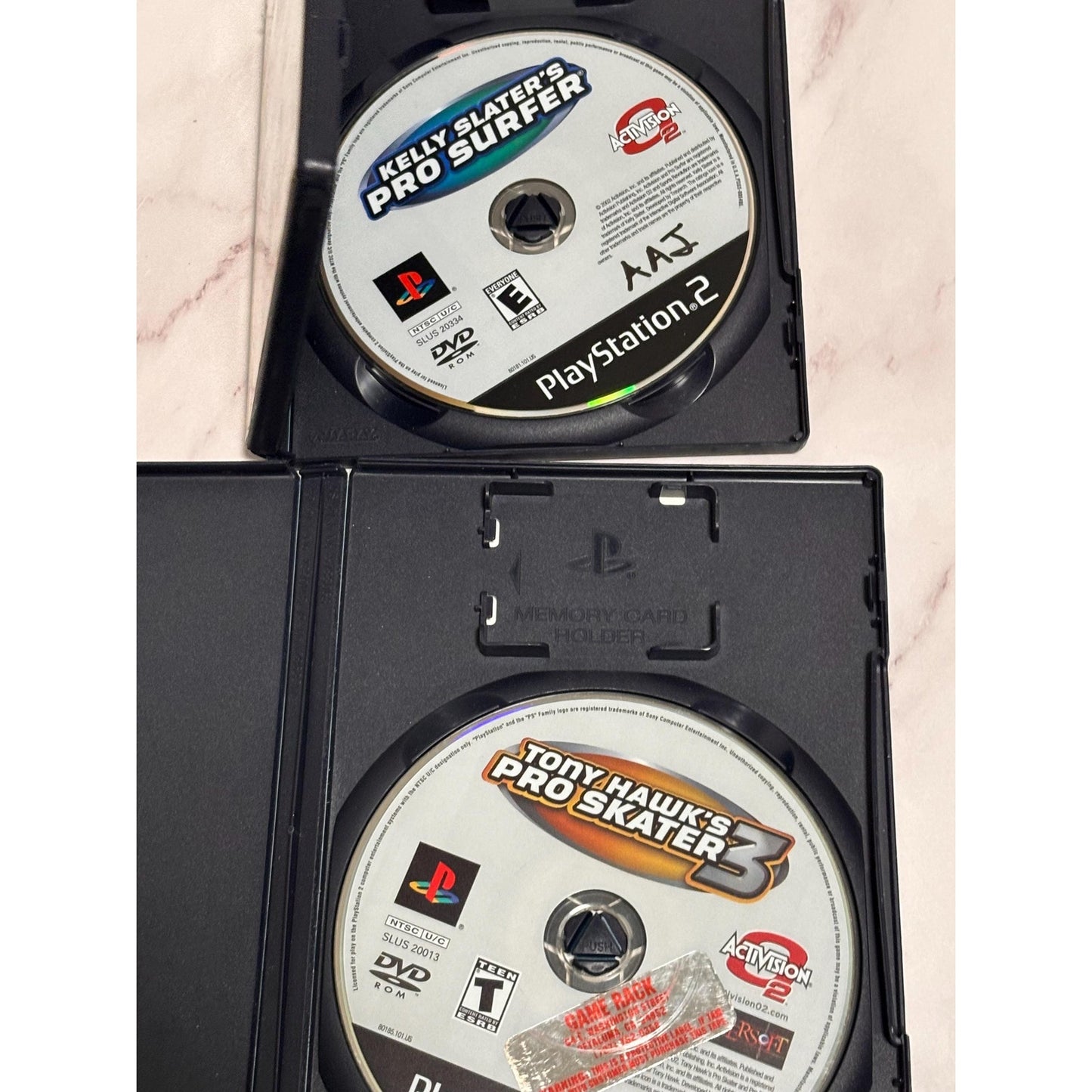 Lot of 2 Play Station PS2 Games Tony Hawk Pro Skater 3 Kelly Slater Pro Surfer